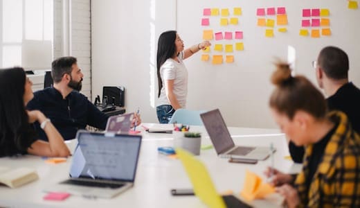 Team reviewing business plans together in a working session